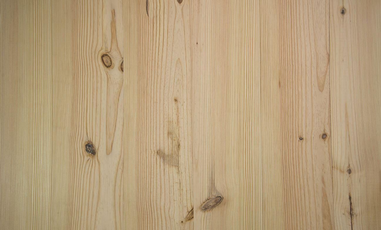 A close up of a wooden surface with a grain and texture.