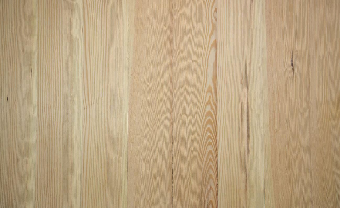 A close up of a wooden surface with a grainy texture.
