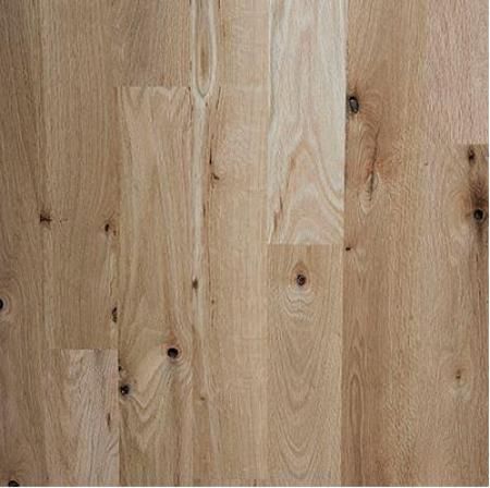 A close up of a wooden floor with a grain and texture.