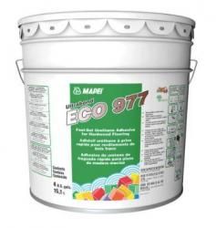 It is a bucket of adhesive that looks like a bucket of paint.