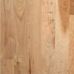 A close up of a piece of wood showing the grain of the wood.