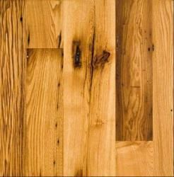 A close up of a wooden floor with a grain and texture.