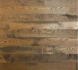 A close up of a wooden floor with a lot of grain.