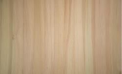 A close up of a piece of wood showing the grain of the wood.