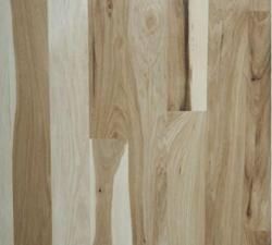 A close up of a wooden floor with a grain and texture.