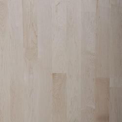 A close up of a white wooden floor.