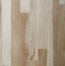 A close up of a wooden floor with a white stripe on it.