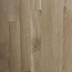 A close up of a wooden floor with a grain and texture.