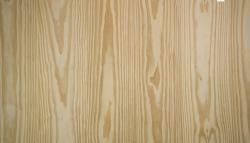 A close up of a piece of wood with a grain pattern.