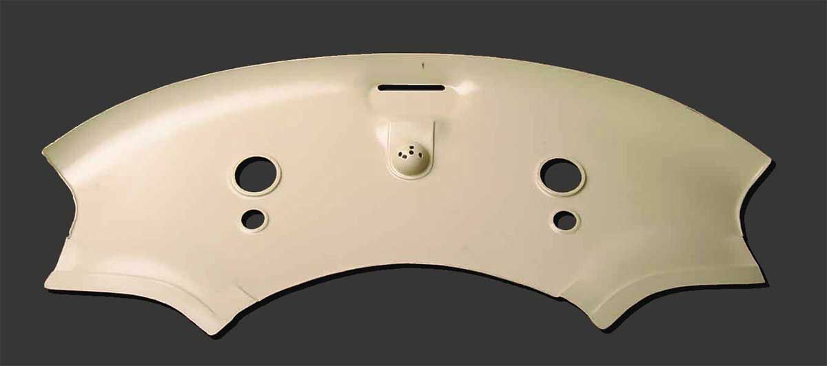 A white object with two holes in it on a black background