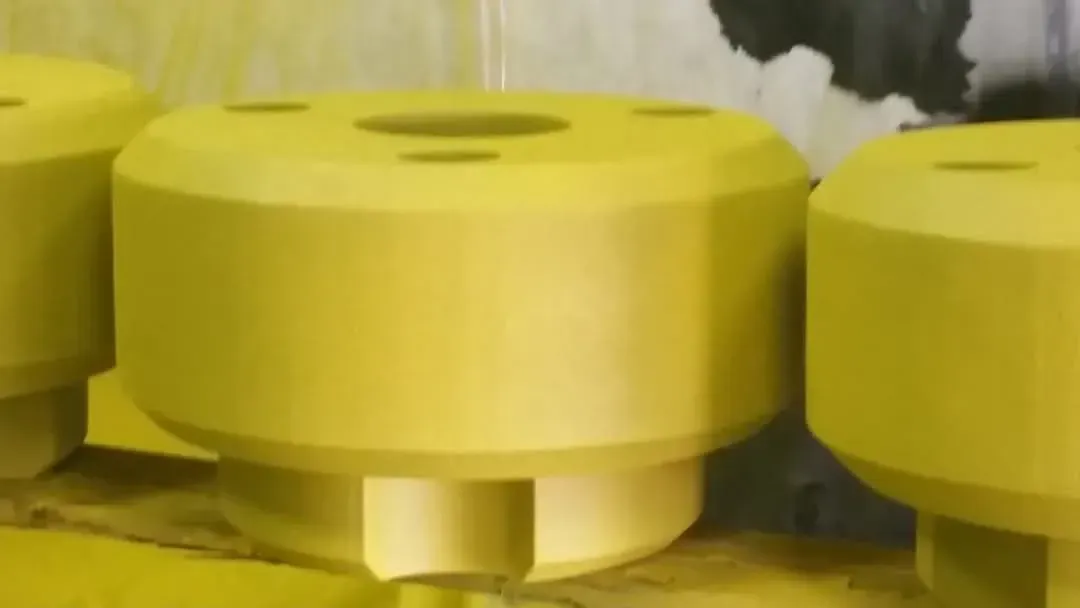 Yellow, cylindrical LEGO-like pieces with holes on top.