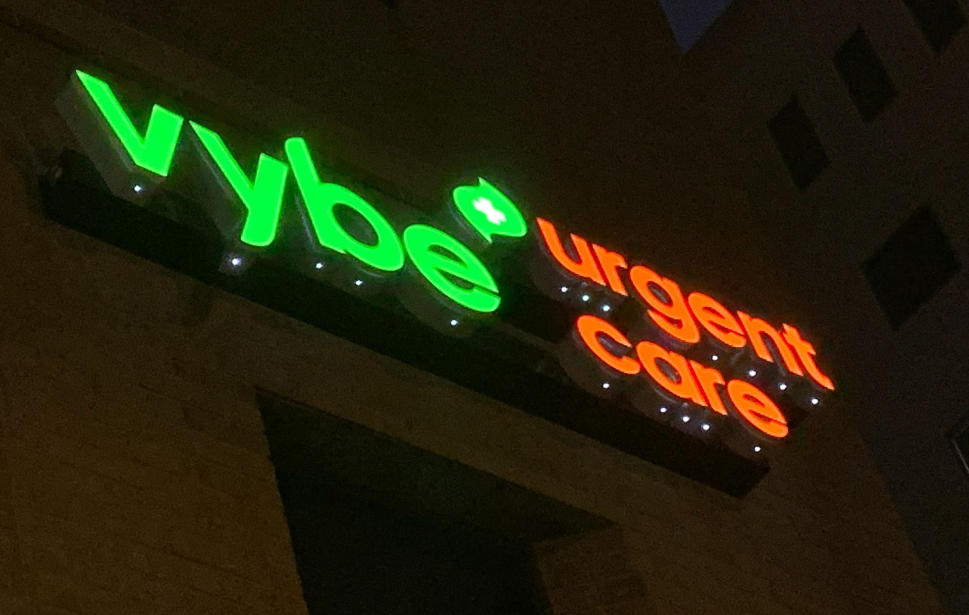 A channel letter sign that says Vybe Urgent Care
