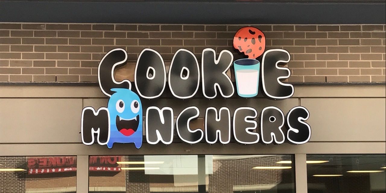 A channel letter sign that says Cookie Manchers