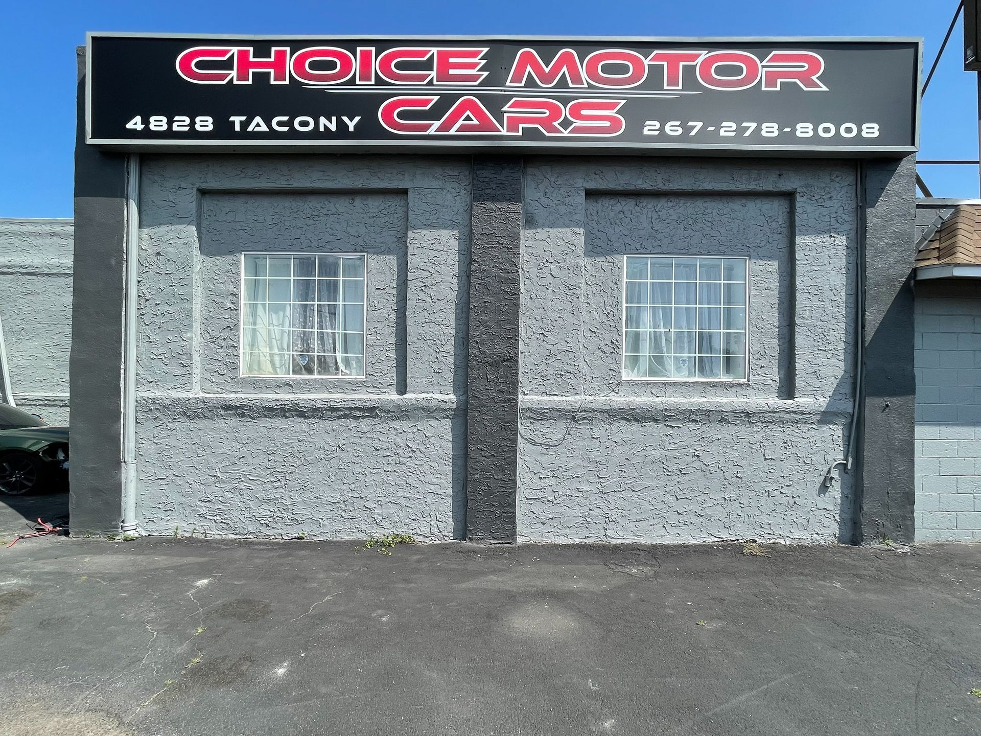 A Choice Motor Car box sign