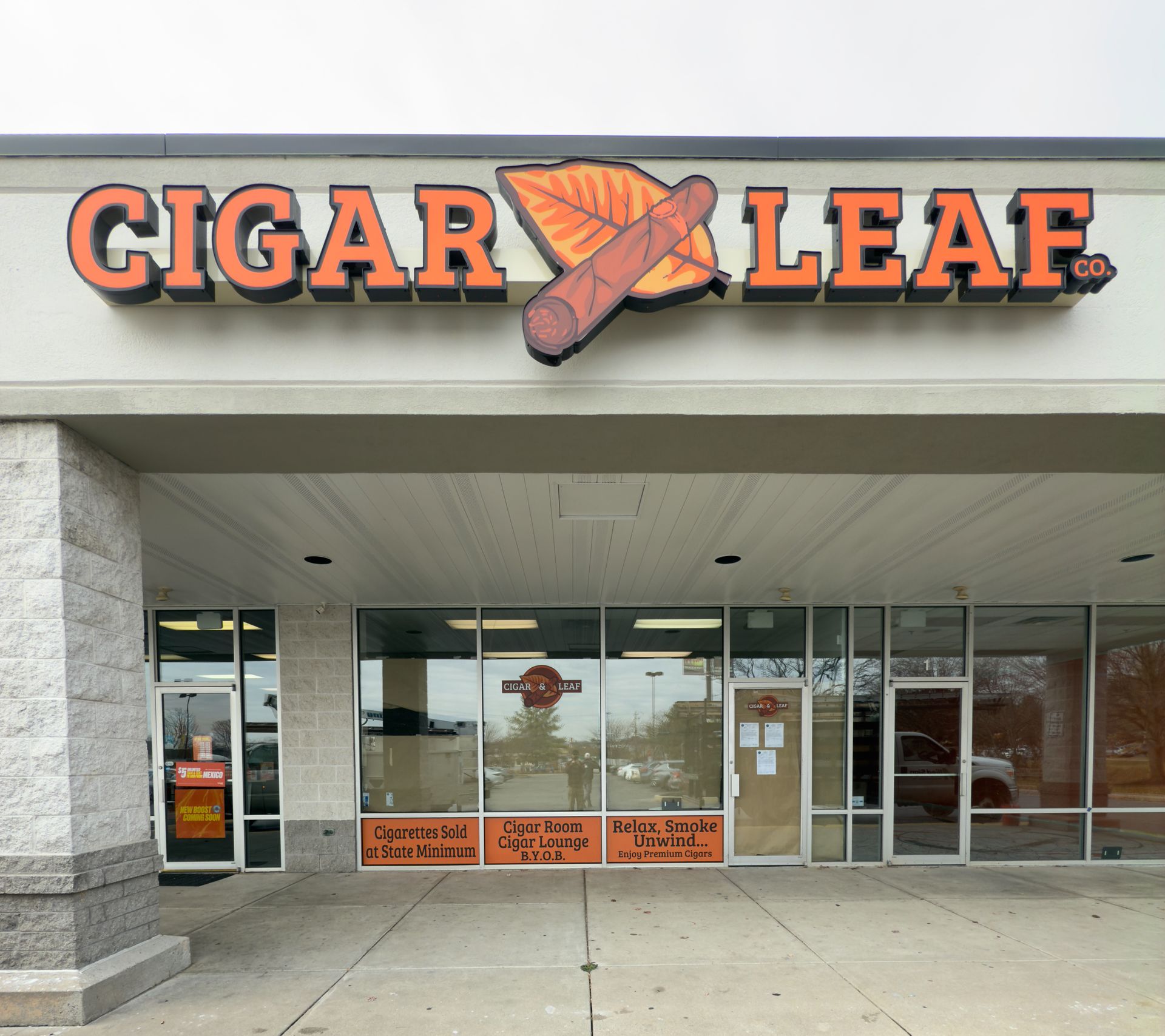 A sign that says Cigar Leaf.