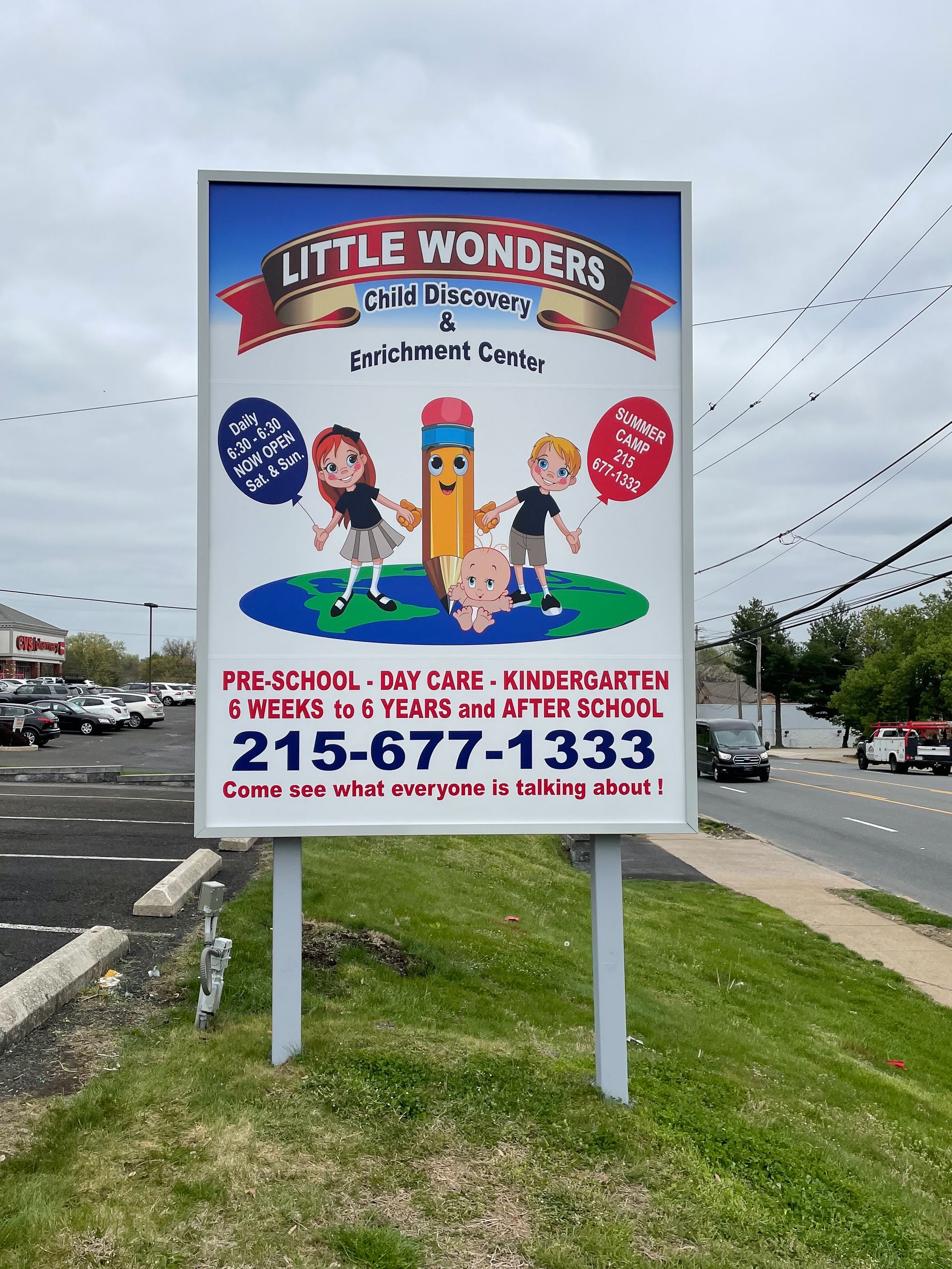 A free-standing that says Little Wonders.