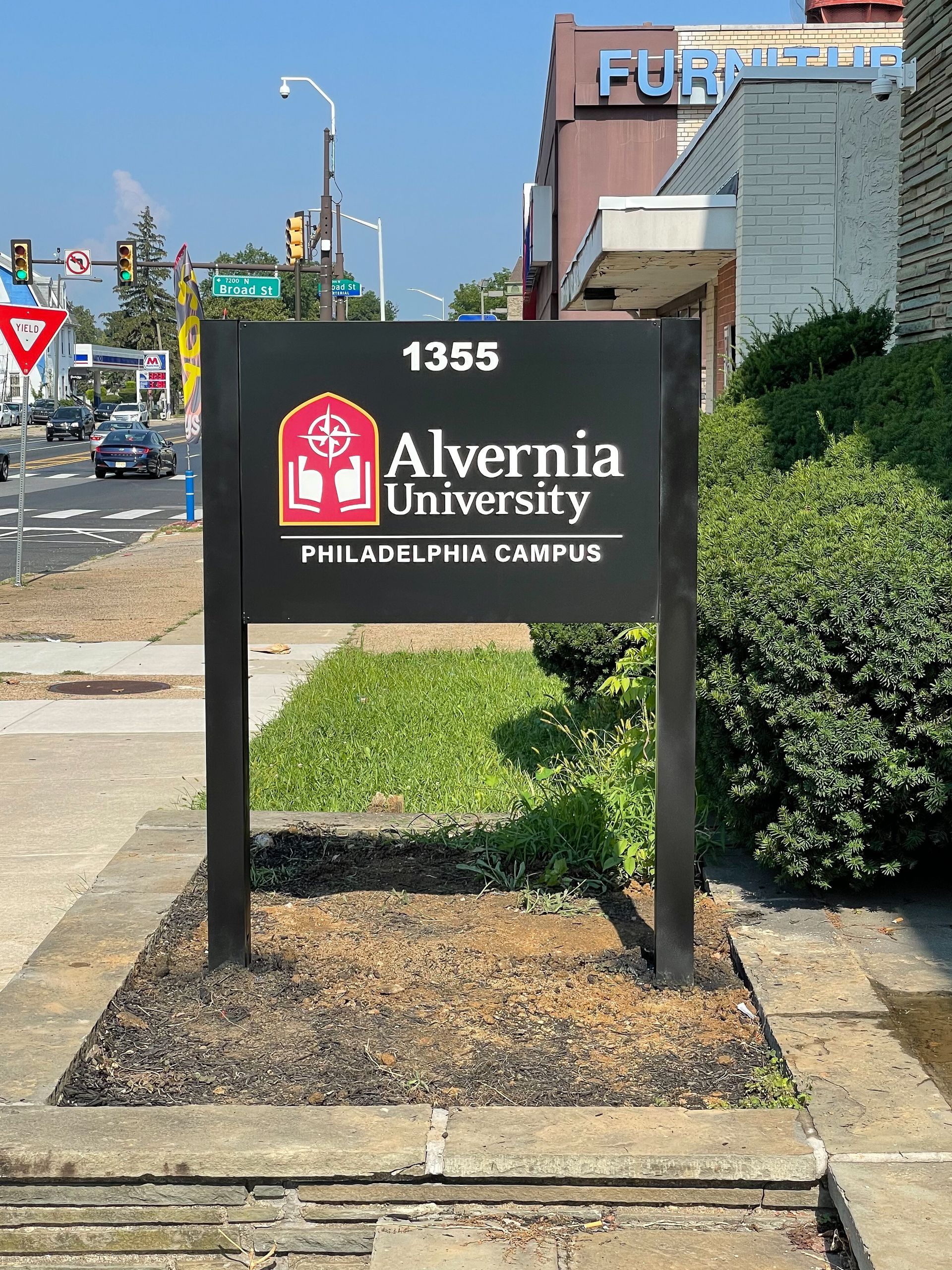 A monument that says Alvernia University Philadelphia Campus.