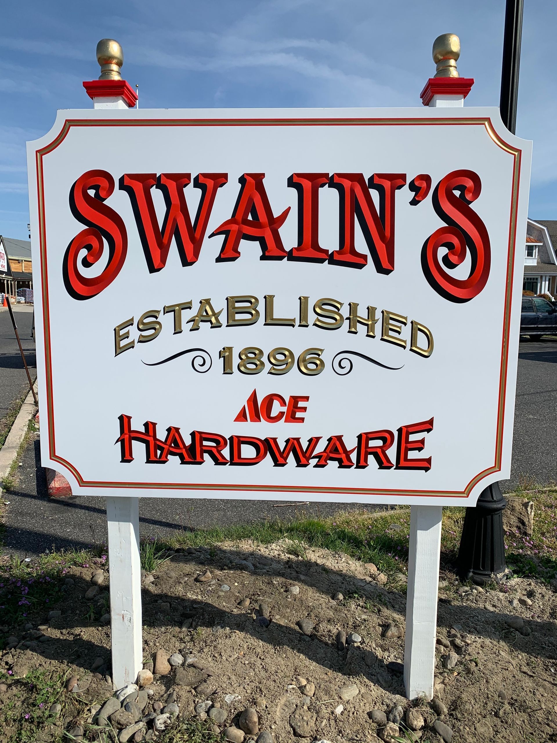 A sign for swan 's established ace hardware