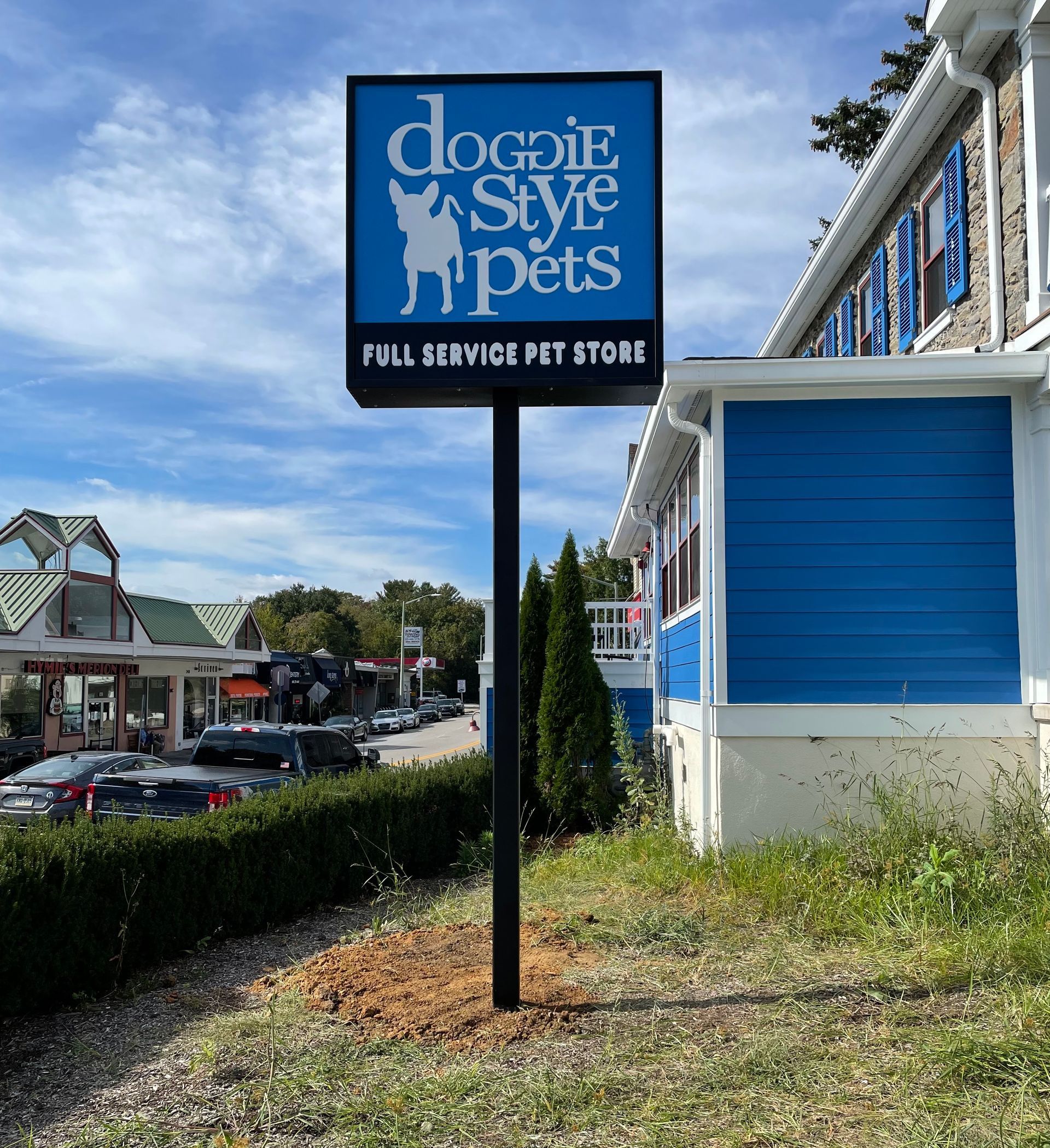 A free-standing that say Doggie Style Pets.