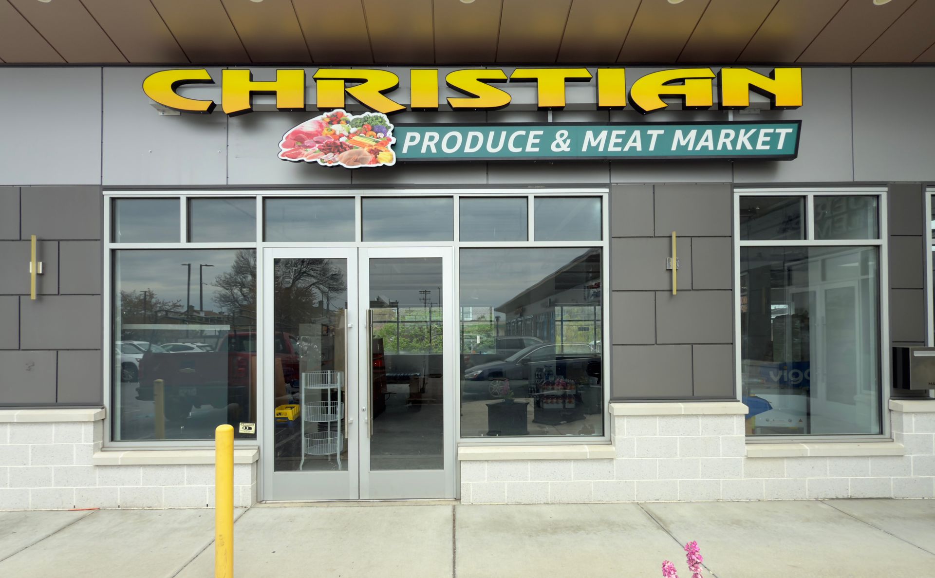 The outside of a christian produce and meat market