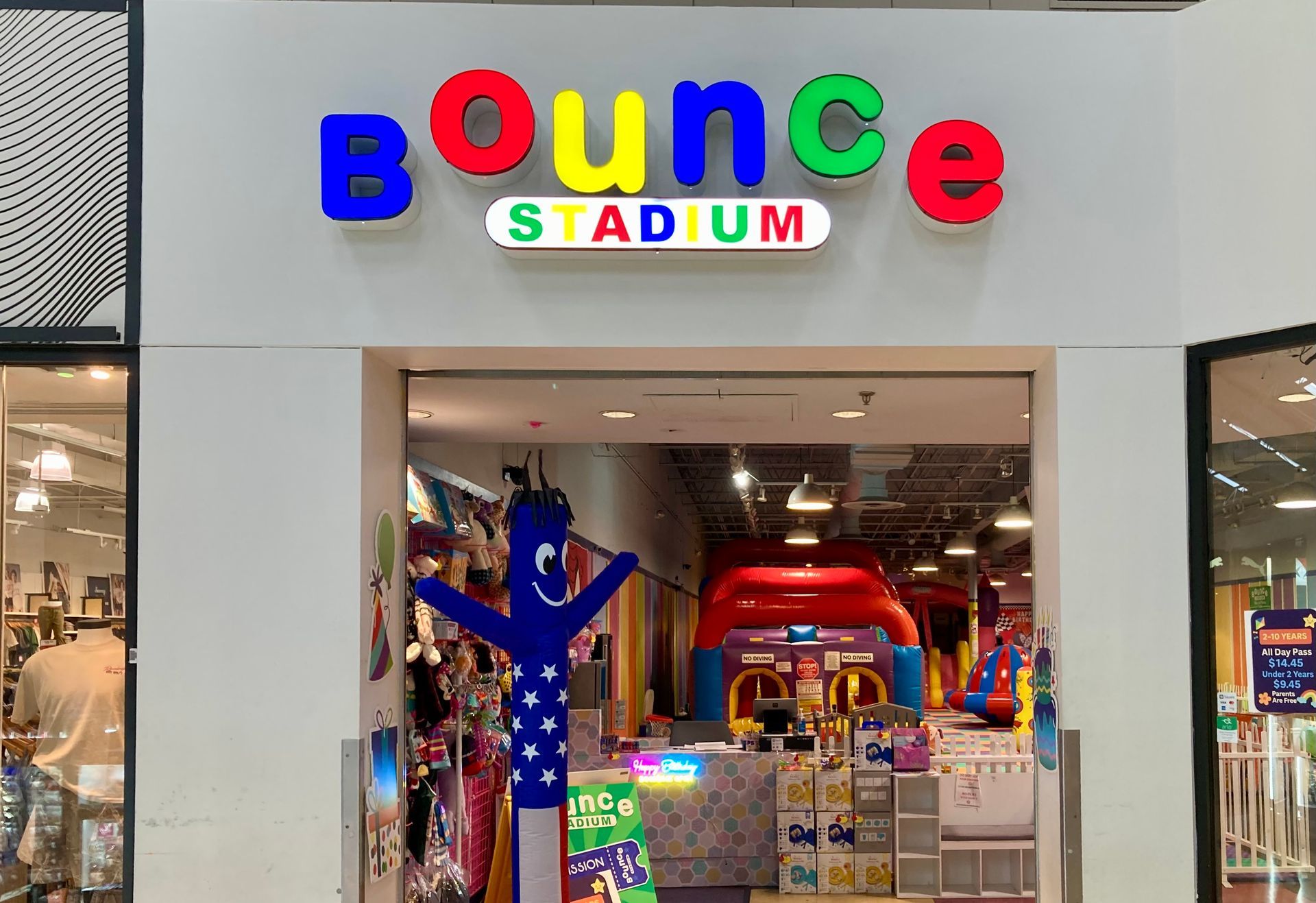 The front of Bounce Stadium in a mall with a colorful sign.