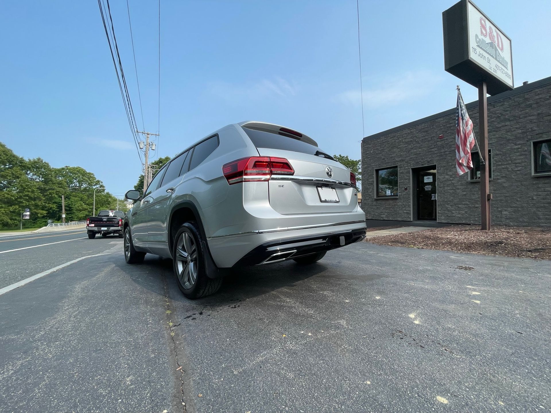 Silver SUV side rear view