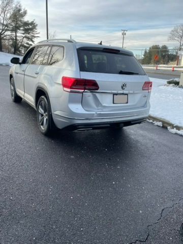 Volkswagen Silver SUV rear side damage