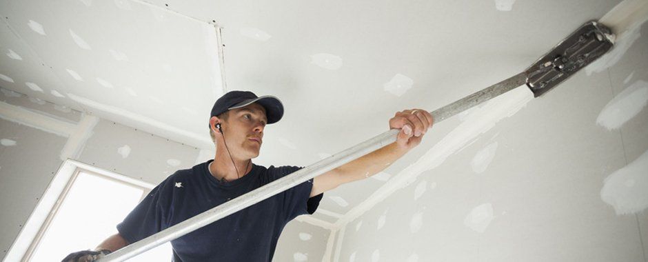 Taping and mudding joints in ceiling