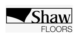 Shaw Floors logo in black and white with stylized “Shaw” and “FLOORS” beneath it