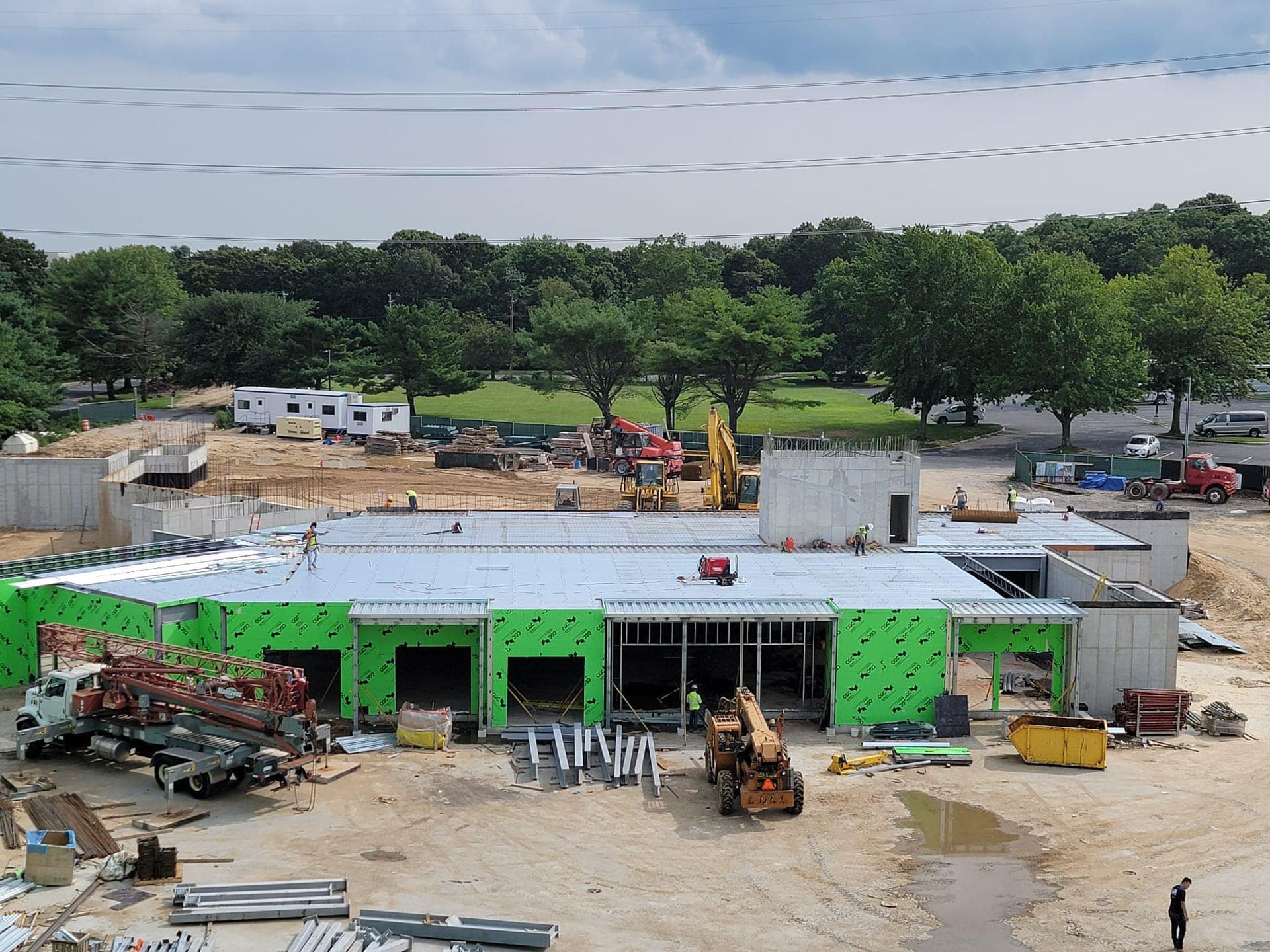 An aerial view of a large building under construction