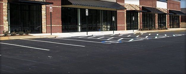 Parking lot pavement sealed