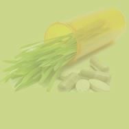 A yellow bottle filled with green beans and pills on a green background.