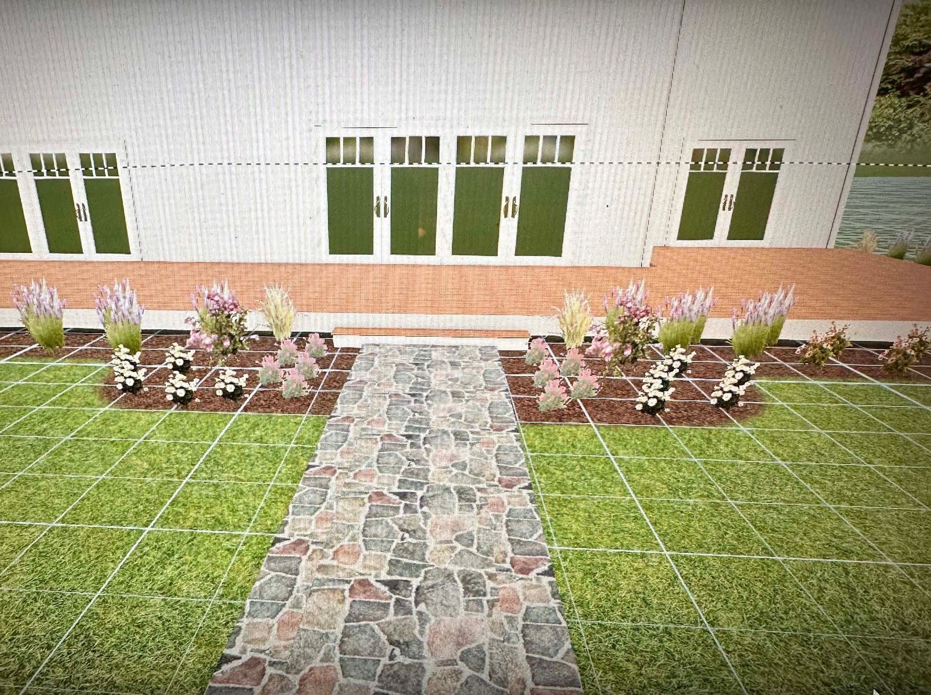 A stone walkway leading to a white building with green doors.