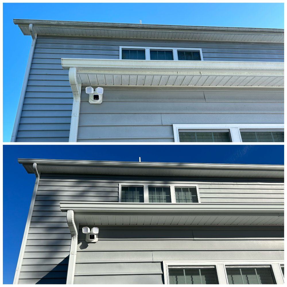 Top shows dirty house siding, bottom shows cleaned siding. Gray siding, white trim, blue sky.
