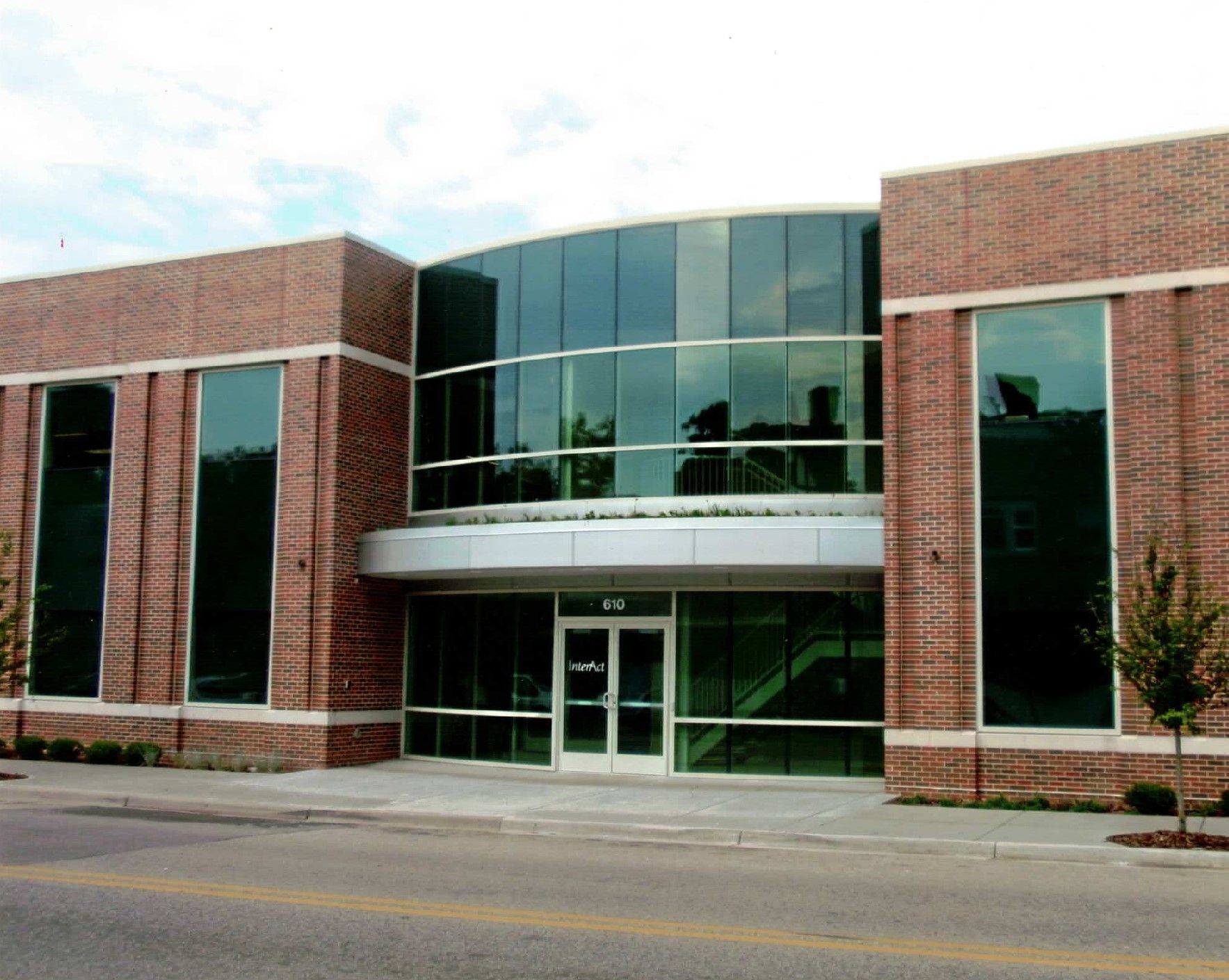 A large brick building with a lot of windows