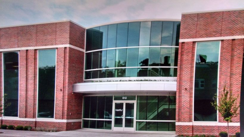 A large brick building with a lot of windows