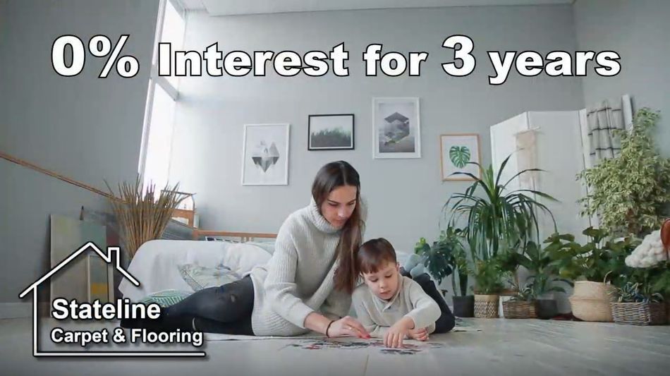 a woman and a child are playing a game on the floor .