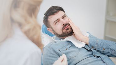 Man having toothache