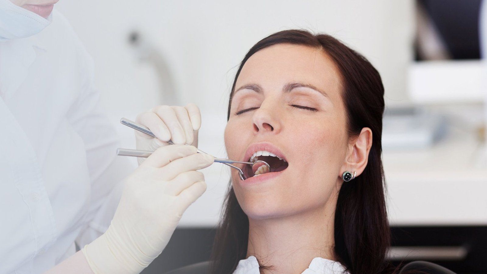 Woman opening her mouth