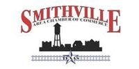 Logo for the Smithville Area Chamber of Commerce, featuring a city skyline silhouette, water tower, and a Texas star.