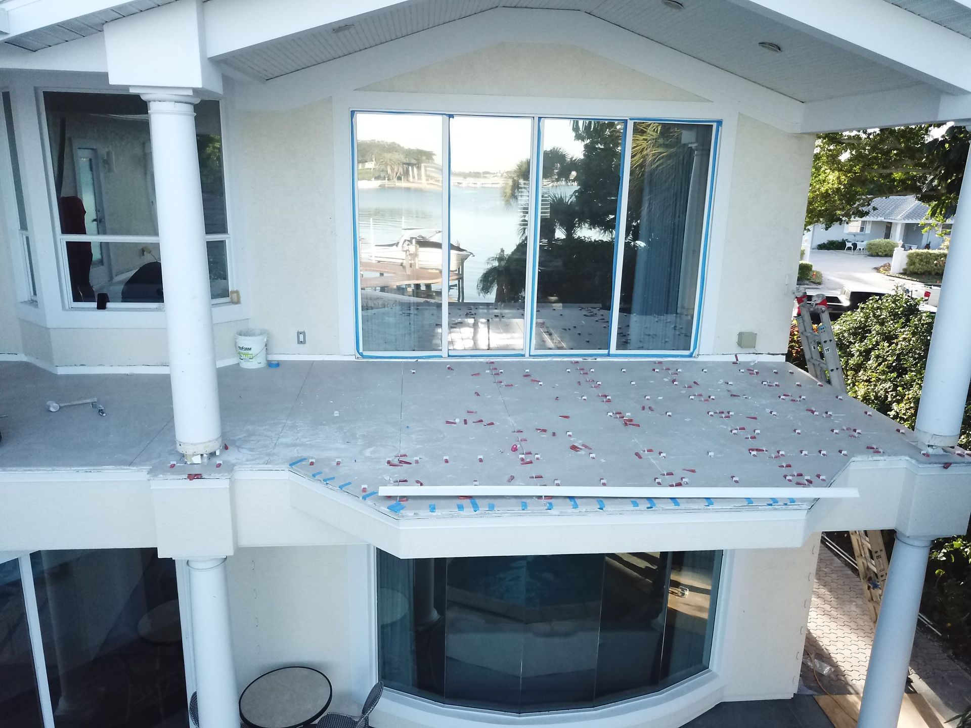 An aerial view of a house with a large window