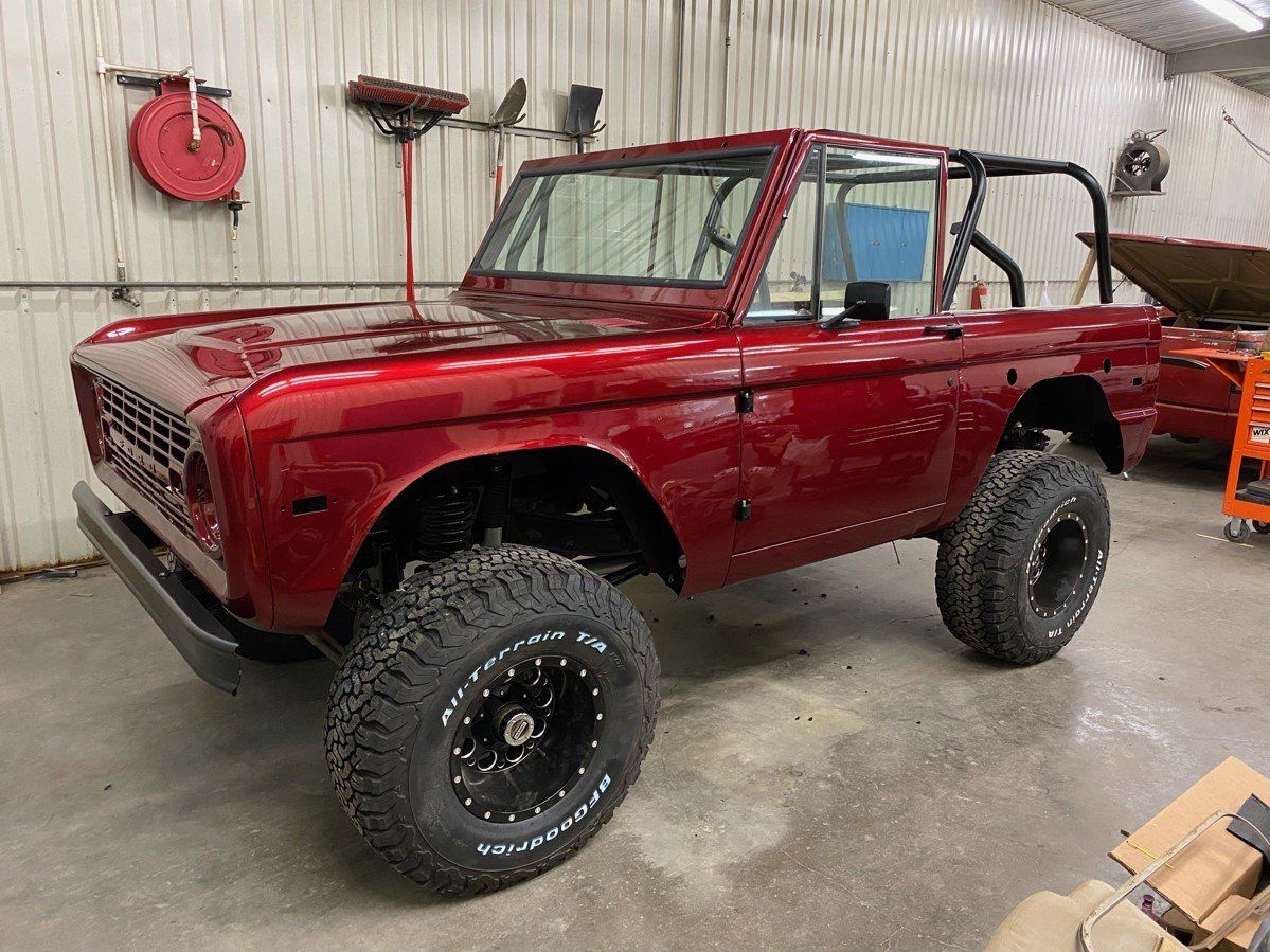 Red Ford truck after
