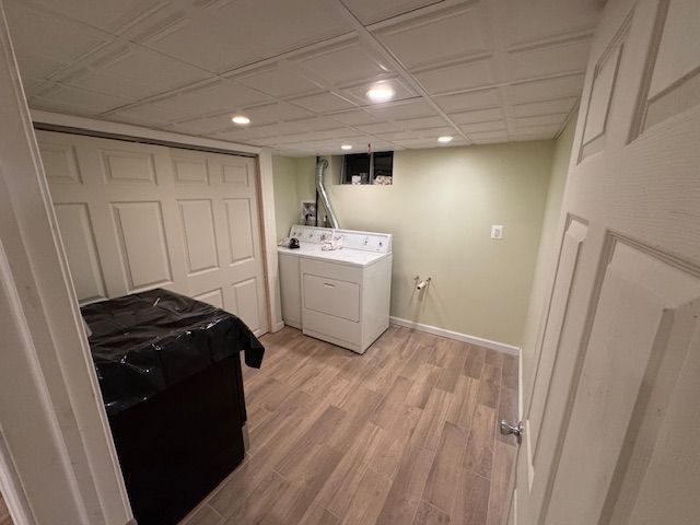 A laundry room with a washer and dryer in it.