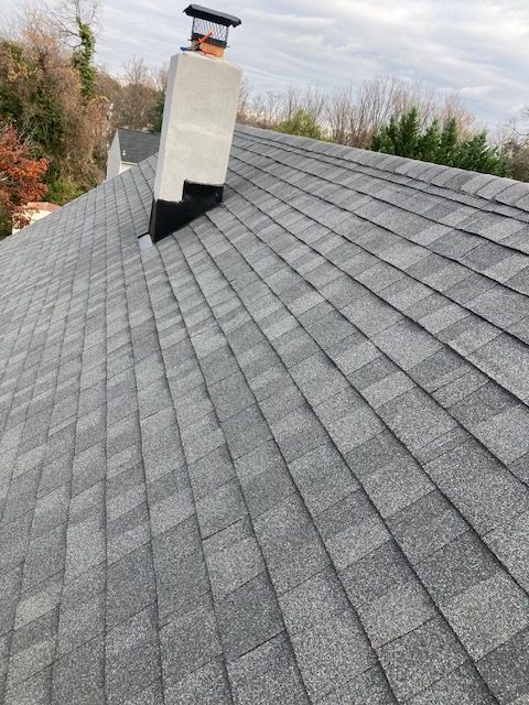 A roof with a chimney on top of it