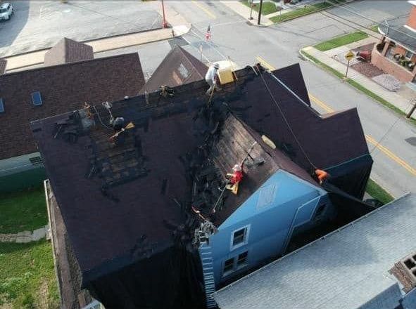 An aerial view of a house being remodeled
