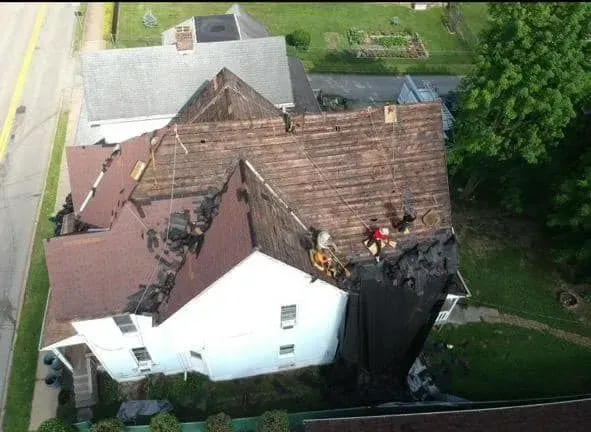 An aerial view of a house that has been damaged by a fire.