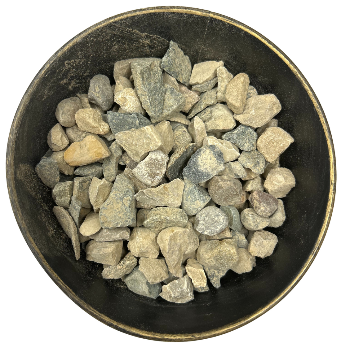 A black bowl filled with rocks on a white background