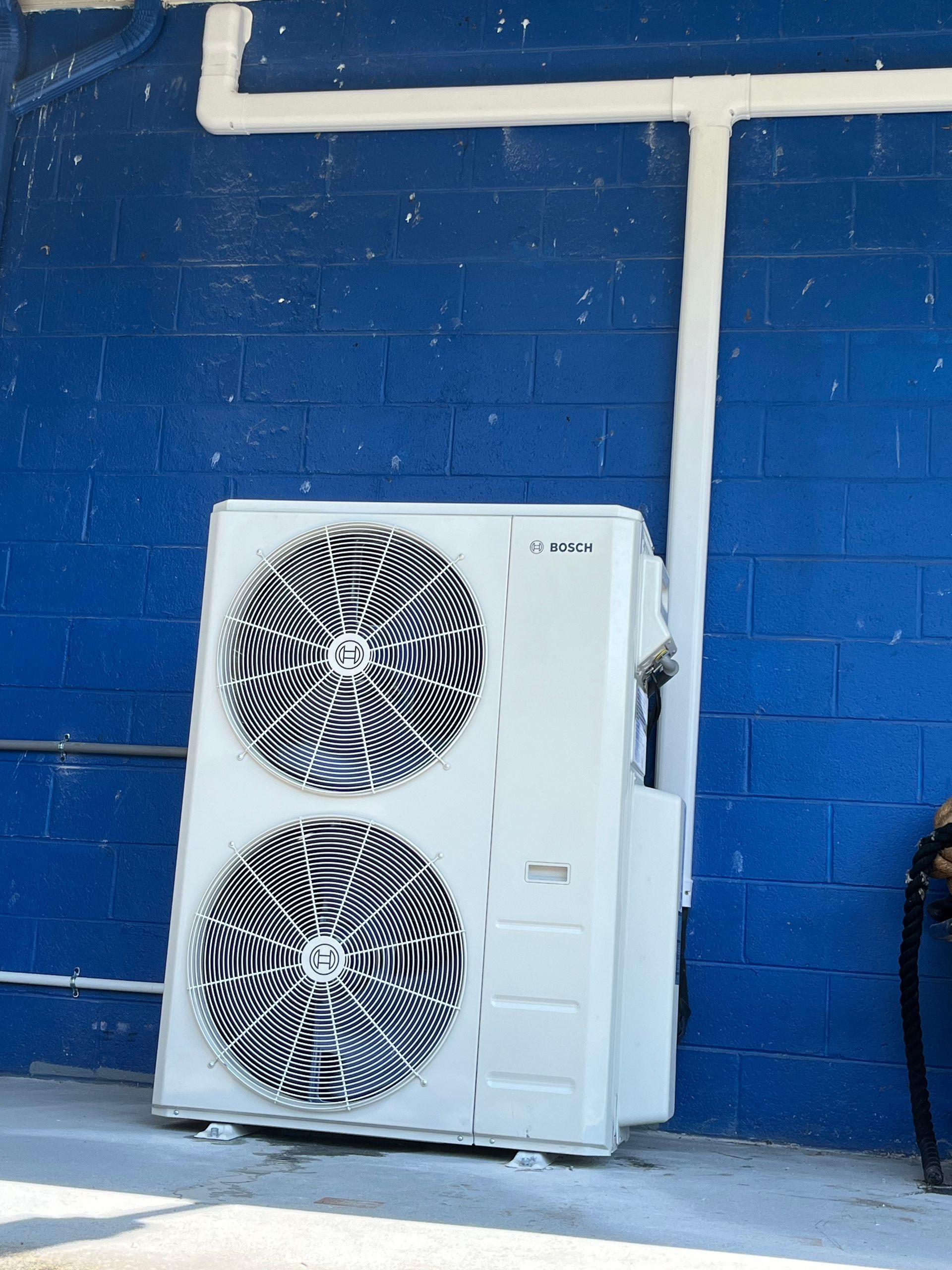 Rea HVAC Bosch IDS inverter heat pump serving a ducted air handler Bosch multi-zone mini-split system commercial
