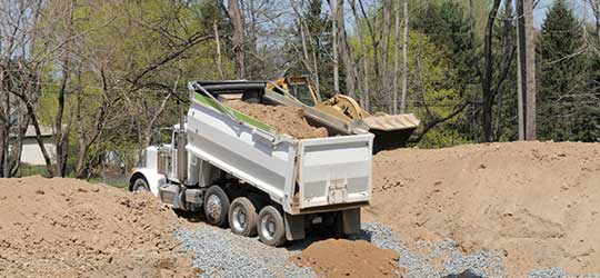 Truck loading soil