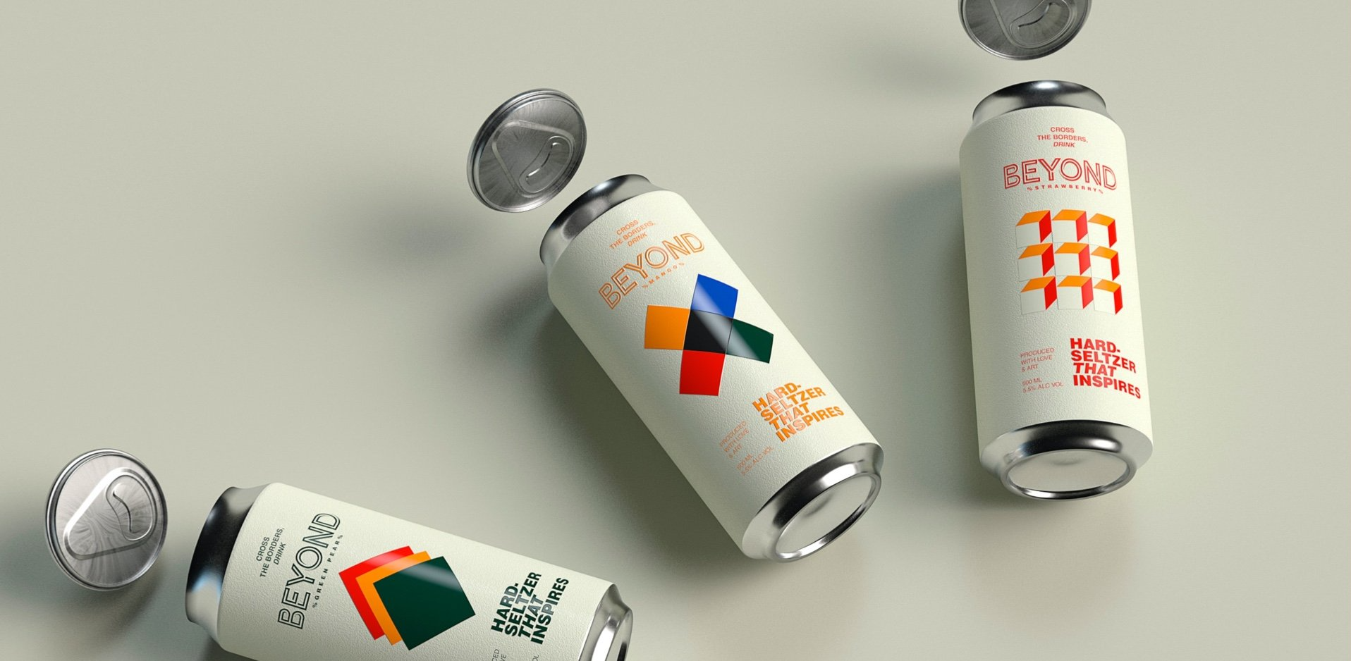 Three beer cans with colorful graphics; silver tops are floating.